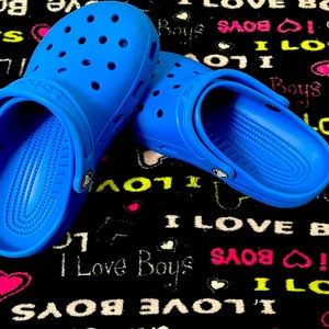 This is a pair of new blue crocs
